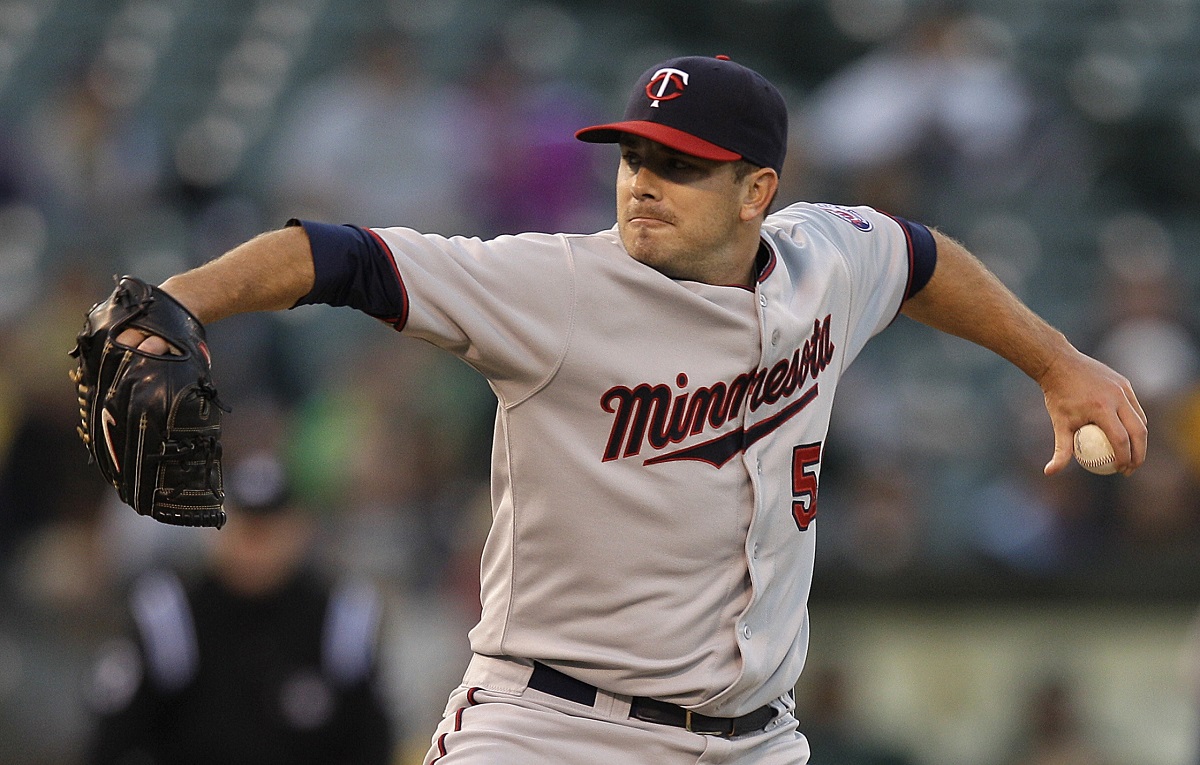 Minnesota Twins' Brian Duensing works against the Oakland Athletics