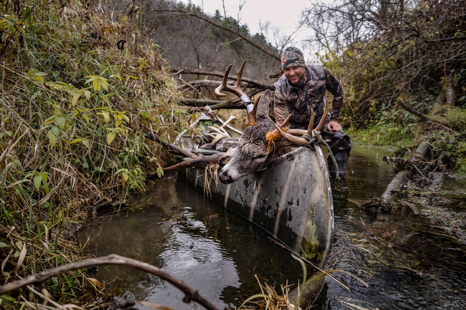 Using a canoe to deer hunt unpressured areas | Big buck in a canoe