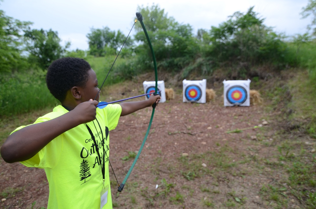 shooting archery at Cedar Springs Adventure Camp